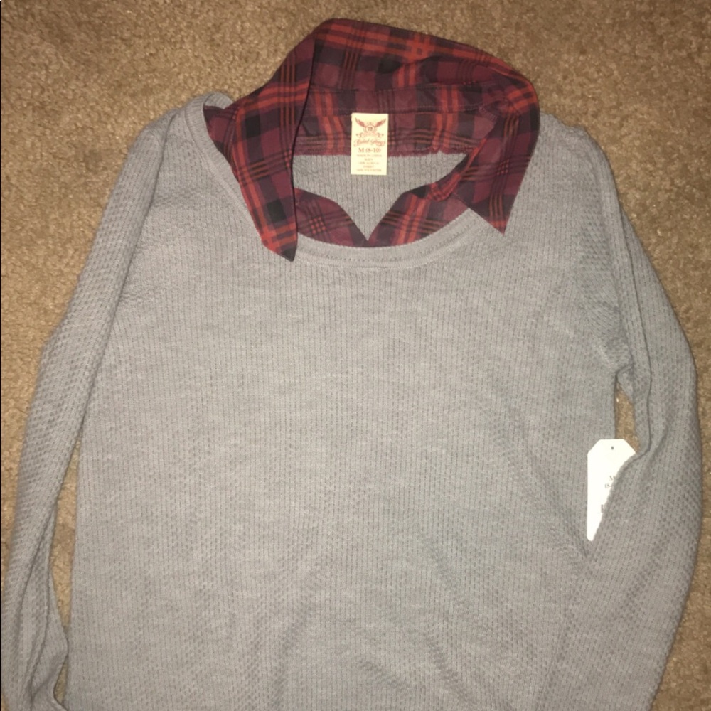 Grey sweater with plaid top underneath